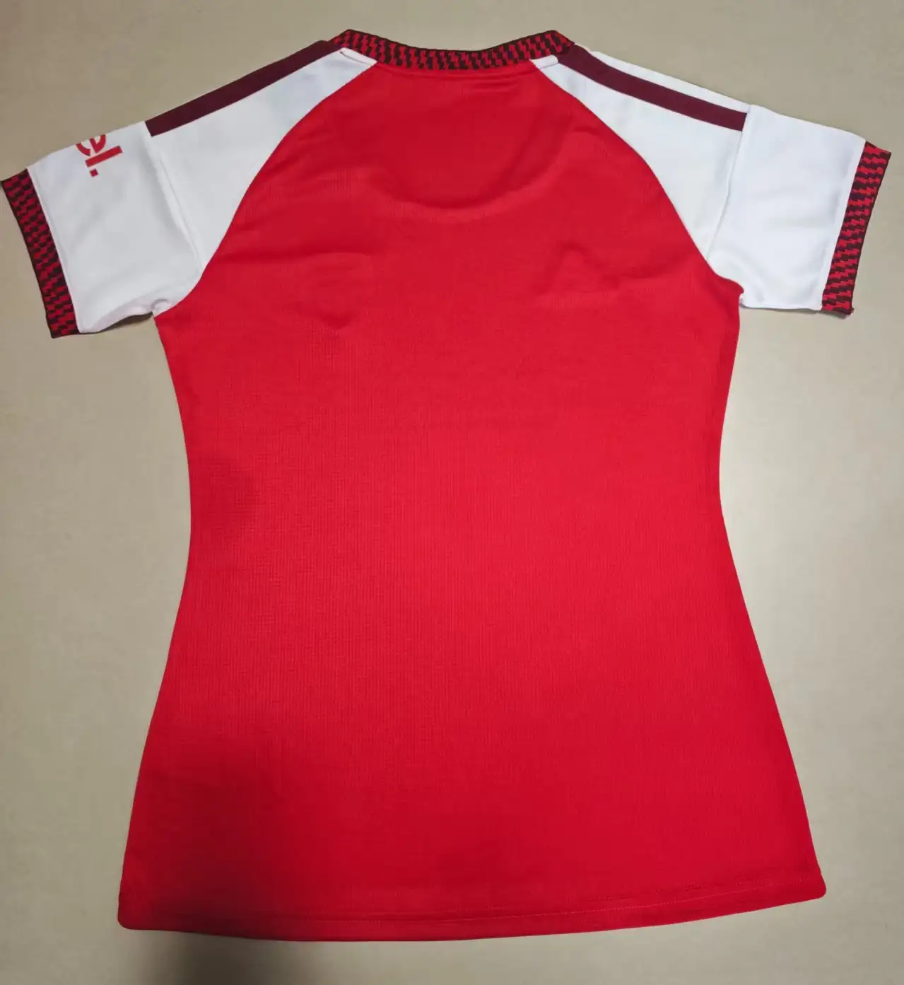 Camiseta Primera Arsenal Mujer 2026 2027-Versión Hincha_1 Camiseta Primera Arsenal Mujer 2026 2027-Versión Hincha_1